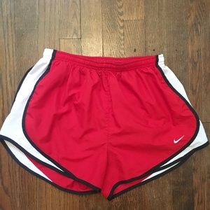 Red Nike running shorts